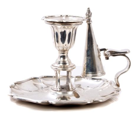 Victorian silver chamber stick of conventional form, with urn candle holder, flower-head drip-tray with wick trimmer aperture