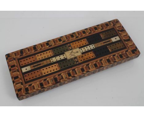 Of Masonic interest: Good 19th century specimen parquetry cribbage board centred by engraved ivory plaque with compass emblem