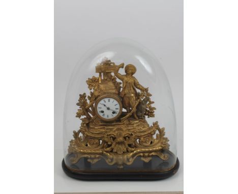 Mid-19th century gilt metal mantel clock decorated with huntsman with sporting gun and hound and floral scroll work, circular
