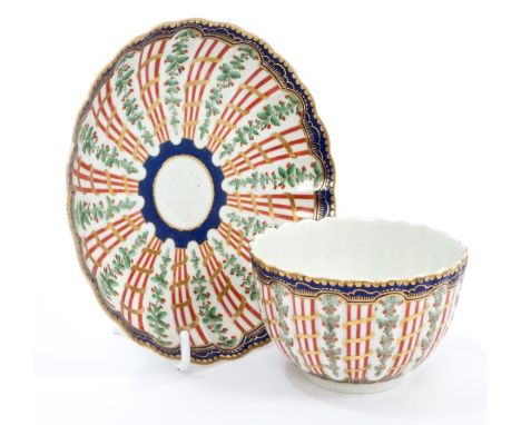 Mid-18th century Worcester 'Hop Trellis' pattern fluted tea bowl and saucer with fine polychrome painted decoration, circa 17