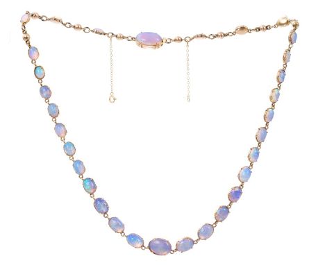 Late Victorian opal necklace with thirty graduated oval cabochon opals, in four-claw closed back setting, with a further opal