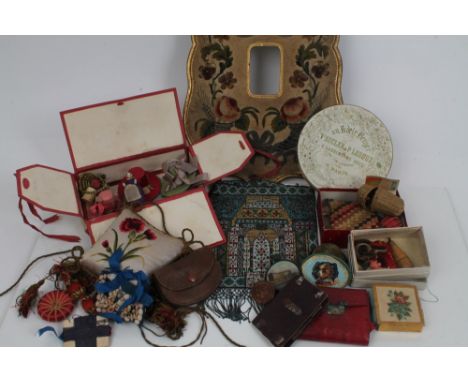 18th / 19th century Continental embroidered picture frame of cartouche form with central rectangular aperture with formal flo