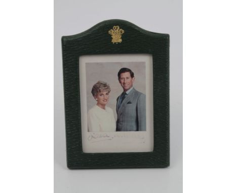 TRH The Prince and Princess of Wales - signed Royal Presentation colour portrait photograph of the smiling couple, signed and