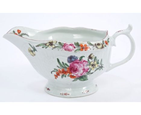 Mid-18th century Worcester sauce boat with moulded cartouches and polychrome painted floral sprays, 17.5cm CONDITION REPORT G