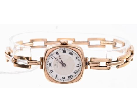 1920s ladies' Omega gold (9ct) wristwatch with Omega movement, numbered 7034113, with circular white enamel dial in cushion-s