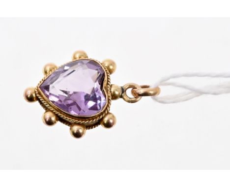 Victorian heart-shape amethyst pendant in yellow metal mount with pellet border, marked - '9ct', 15mm x 14mm CONDITION REPORT