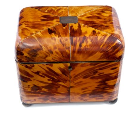 Good George III blond tortoiseshell and ebony line-inlaid tea caddy of cushion form, on silvered ball feet, the hinged cover 