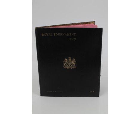 The Royal Tournament 1929 - leather desk blotter with cast gilt Royal Coat of Arms to cover and embossed Captain C W C King a