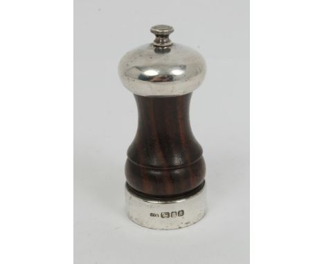 Contemporary silver mounted pepper grinder of capstan form, with turned rosewood body (London 1990), maker - D. R. M., 10.5cm