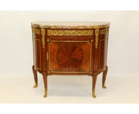 Good Louis XVI-style kingwood parquetry inlaid and gilt metal mounted bowfront commode with shaped variegated marble top abov