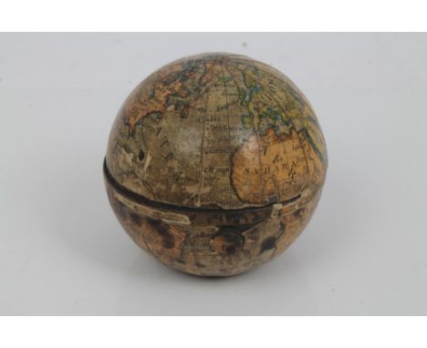 Late 19th century novelty globe inkwell with coloured laid paper globe segments, with push-release hinging to reveal twin ink