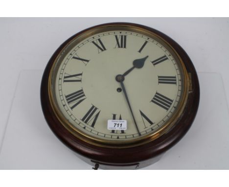 19th century wall clock with eight day fusee timepiece movement, 12 inch white enamel dial with Roman numerals, in a circular