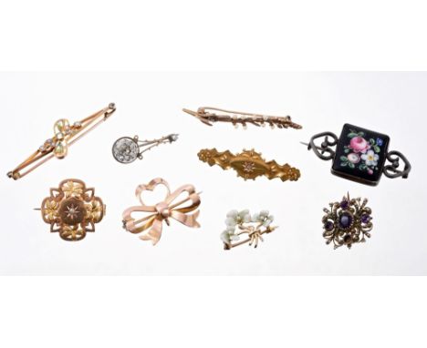 Early 20th century gold and enamel four-leaf clover brooch, Edwardian peridot and seed pearl brooch and seven other antique b