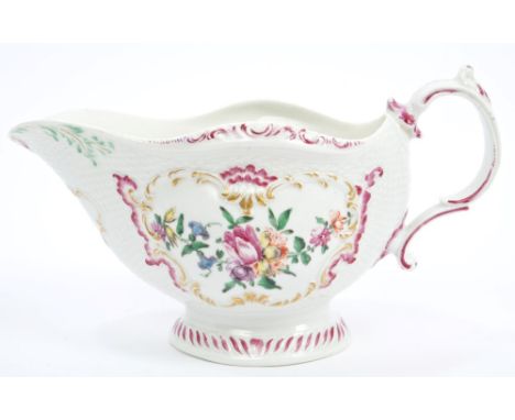 Large 18th century Worcester moulded sauce boat with moulded basket-weave and cartouches, polychrome floral sprays with puce 