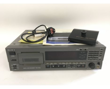 A boxed Sony PCM-2700A DAT recorder with 4 way audio controller, manual and power supply.