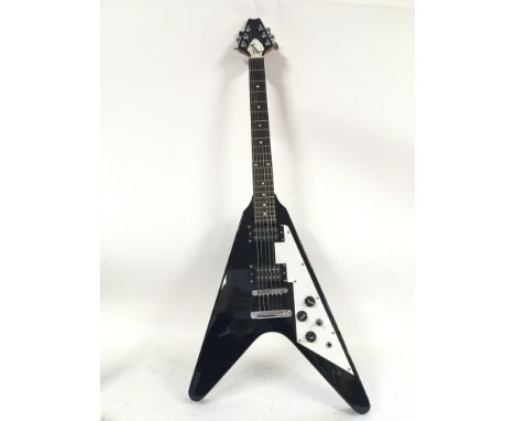 A Stagg Flying V shaped electric guitar with Gibson decal to headstock. Comes supplied with a hard carry case.