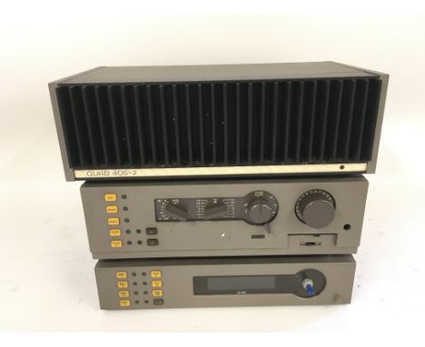 A Quad 405-2 amplifier, Quad FM-4 tuner and a Quad 44 control unit, all boxed (3).