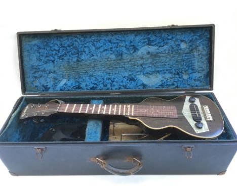A circa 1930s Kalamazoo KEH electric lap steel with fitted case having an integral amplifier.