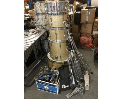 A Premier gold sparkle drumkit with cases, stool, sticks, no cymbals but comes with a box of extra drum parts including extra