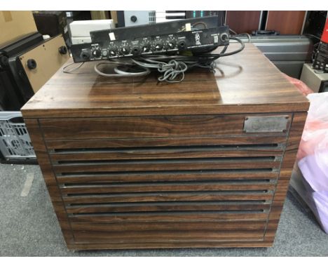 A Leslie rotating speaker with a wired amp control board.