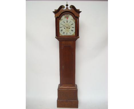 A George III oak and mahogany crossbanded 8 day longcase clock, the 13" arched enamel dial painted with Roman numerals, minut