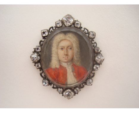 Mid 18th Century Continental School, poss German , miniature portrait of a gentleman wearing a wig, in the oval, on ivory, mo