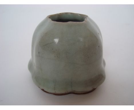 A Chinese celadon glazed brush washer, of lobed form, blue Qianlong seal mark, 6.5cm high. 