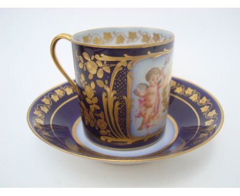 19th Century Sevres, Louis Philippe cabinet cup and saucer, the cup with rectangular panel decorated with gilt crowned initia
