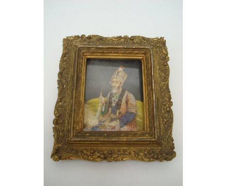 Mid 19th century Indian School. Portrait of Bahadhur Shah II (1775-1862) seated against a bolster and holding the mouth piece