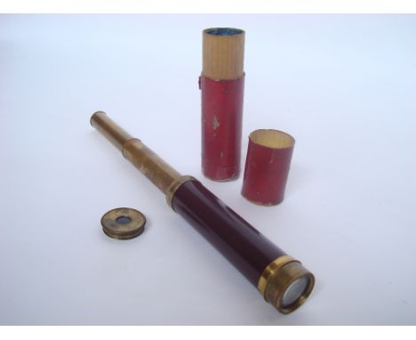 A 19th Century three drawer brass telescope with ebonised body in leather outer case. 