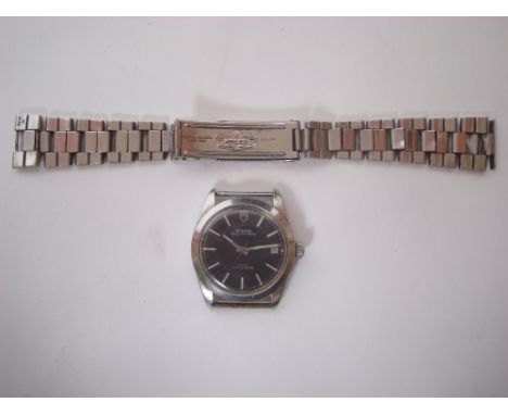 A Gents rotor self winding steel cased Tudor Prince Oysterdate wristwatch, the matt black dial with luminous baton hour marke