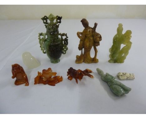 A quantity of Oriental collectable figural carvings to include Jade and soapstone (9)