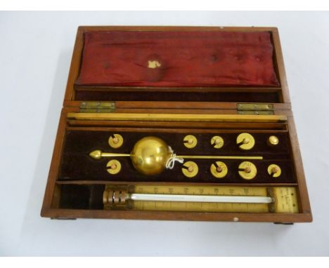 A late 19th century Sykes hydrometer in mahogany fitted case