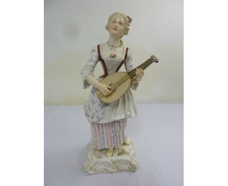 A 19th century Meissen figurine of lady strumming a lute, 46.5cm (h), A/F