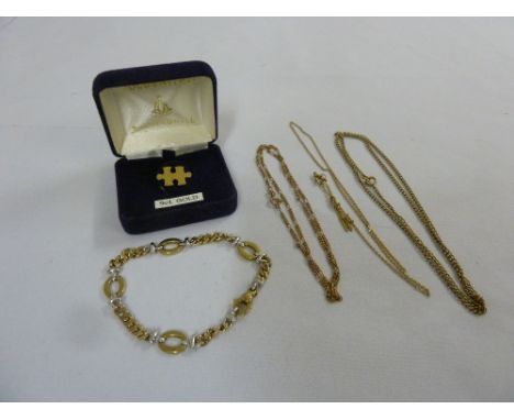 A quantity of 9ct gold jewellery to include a bracelet, three chains and a tie pin, approx 25g