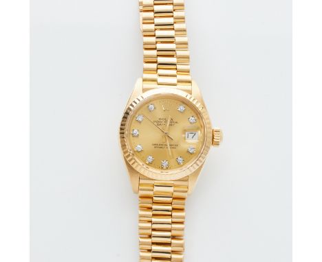 Rolex-DamenarmbanduhrFa. Rolex, Swiss. Modell: Lady-Datejust. 750/- Gelbgold, gestemp. Gewicht: 66,5 g. 10 Diamanten im 8/8el