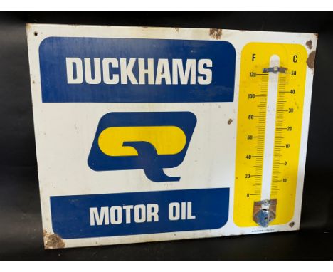 A Duckhams Motor Oil enamel garage wall thermometer by Burnham of London, lacking thermometer, 26 1/4 x 20 1/4".