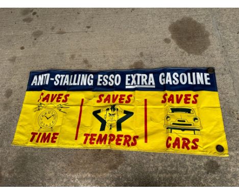 An Esso Extra Gasoline canvas banner, 78 1/2 x 33 1/2". 