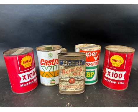 Four sealed motor oil pint tins inc. Shell, BP and Castrol and a British Burning Oil oiler. 