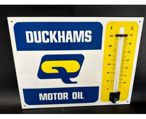 A Duckhams Motor Oil enamel wall thermometer by Burnham, London, 26 1/4 x 20 1/4". 