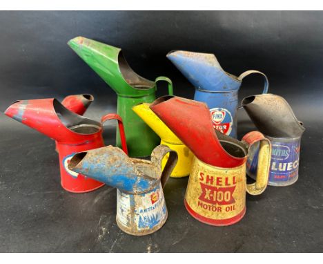 Eight oil pourers inc. Shell X-100 pint, Smiths Bluecol, Fina, Esso, Shell anti-freeze etc. 