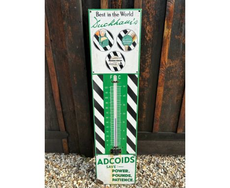 A Duckham's Adcoids enamel garage wall thermometer with replacement tube, 11 1/4 x 45 1/2".