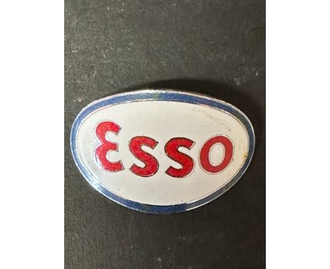 An Esso enamel cap badge by Firkin, London, 2 1/4" wide.