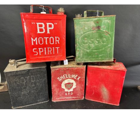 Five two gallon cans: two BP Motor Spirit, an Esso, a Shell-Mex Ltd. and a plain, various caps, see image. 