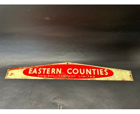 An Eastern Counties Omnibus Company Limited enamel advertising sign, 22 1/2 x 3 1/4". 