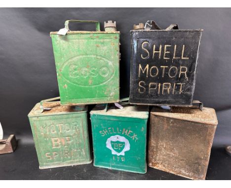 Five two gallon cans: Esso, Shell Motor Spirit, BP Motor Spirit, Shell-Mex and a plain, various lids see images. 