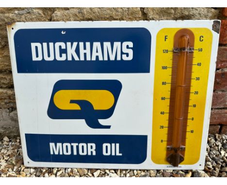 A Duckhams Motor Oil garage wall advertising thermometer by Burnham Signs, 26 x 20". 