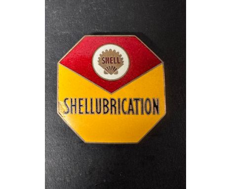 A Shell Shellubrication enamel cap badge by R Gaunt &amp; Son London, 2 x 2". 