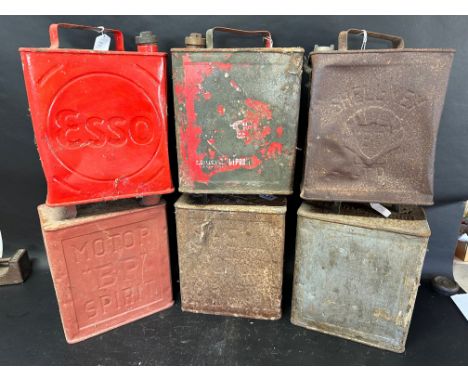 Six two gallon cans: Esso, BP Motor Spirit, Shell Motor Spirit, Shell-Mex, Shell Motor Spirit and two plain, various caps see