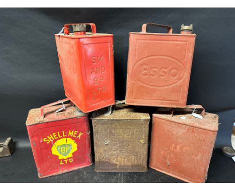Five two gallon cans: Esso, Shell-Mex, SM&amp;BP, BP Motor Spirit and a plain, various caps see images. 